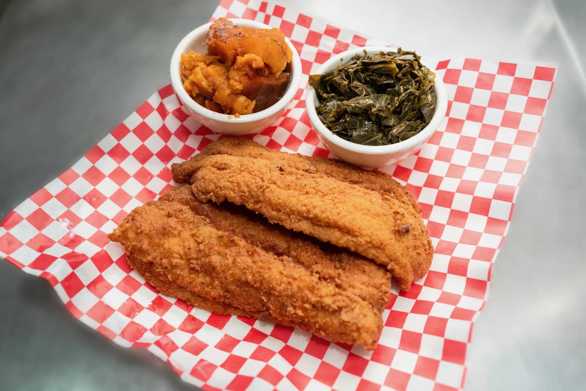 GG’s fried catfish with collard greens and yams