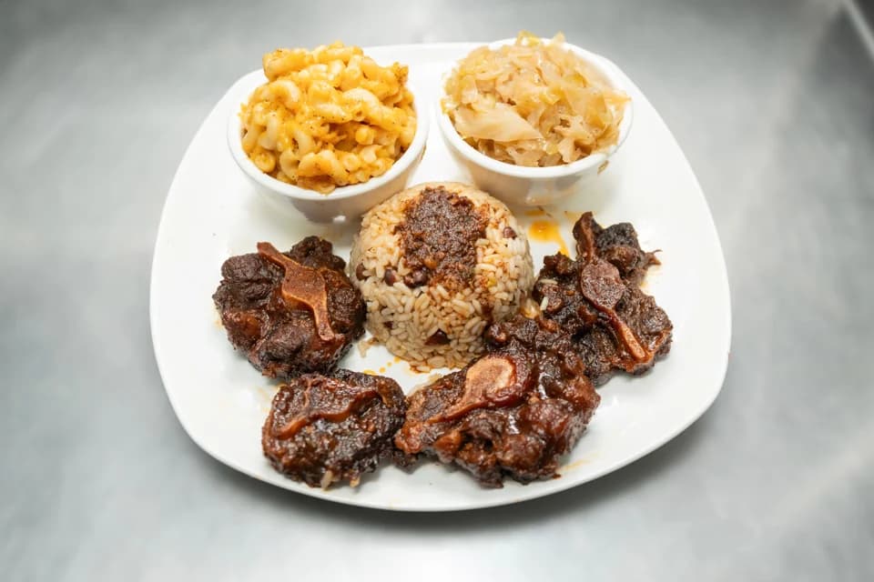 Oxtails with rice and sides